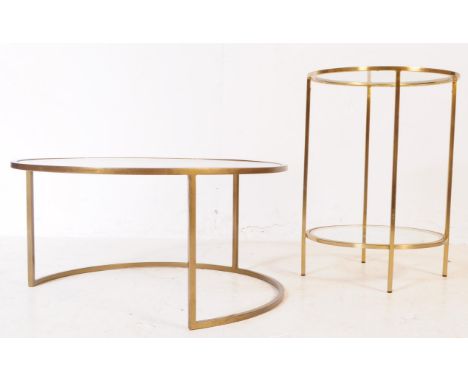 Two vintage 20th century occasional / coffee tables. Of circular from and different sizes, with drop in glass tops and one un