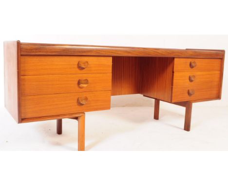 White and Newton - A mid 20th century circa 1960s teak wood dressing table desk. The desk of rectangular form featuring two b