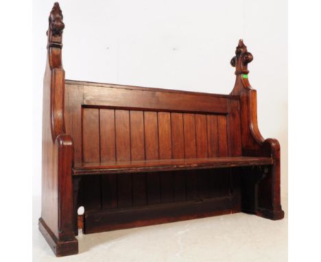 A Victorian 19th century oak ecclesiastical gothic church settle bench pew. Having fleur de lys carved top. Rectangular woode