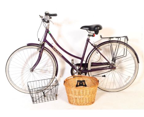 Raleigh - A vintage 20th century ladies Raleigh step through hybrid push bike / bicycle. Of purple colourway with bike stand,