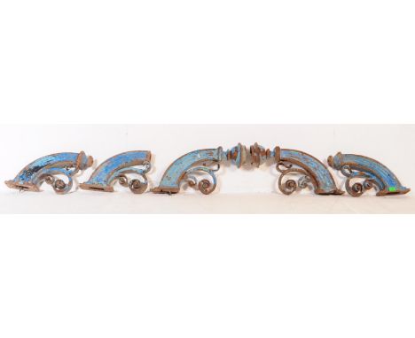 A collection of five early 20th century gas lamp lantern bracket / fixings. Painted in a blue colourway with curved design an