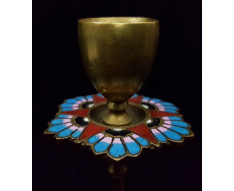A pair of French Champleve enamel candlesticks, in the style of Barbedienne, with enamelled sconce and foot of heart form mot
