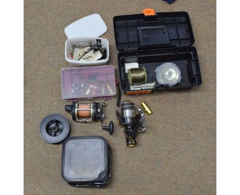 Mixed lot of fishing equipment to include line reels, reels, tools and weights etc