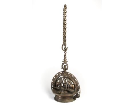 A BRONZE HANGING LAMP, KERALA, SOUTH INDIA, 19TH CENTURY the circular base surmounted by reservoir with projecting wick holde