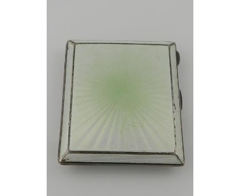 An Deco silver cigarette case, having engine turned decoration with Eau de Nile green guilloche enamel, hallmarked Birmingham