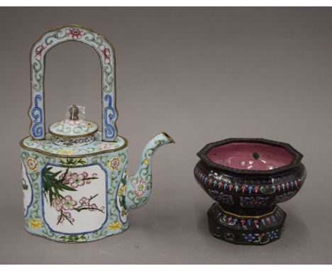 An 18th century Chinese Canton enamel hexagonal footed bowl in the Limoges style and a later Canton enamel wine pot. The latt