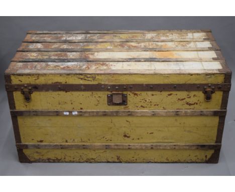 A late 19th century/early 20th century Louis Vuitton iron bound travelling trunk. 110 cm long x 56 cm deep x 57 cm high.