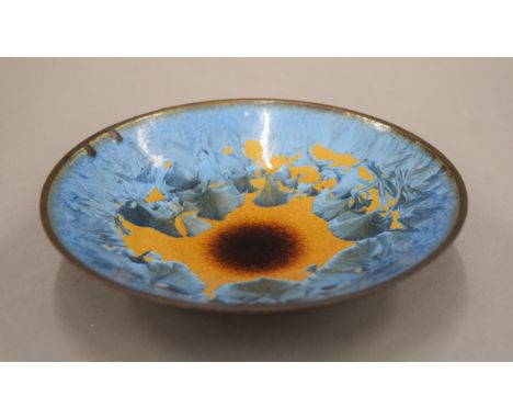 A Studio pottery bowl with enamel glaze decoration. 16 cm diameter.
