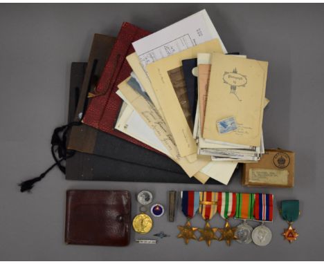 A quantity of militaria and ephemera. Items relating to Lance Corporal Reginald Wallis comprises of a bar of five medals incl