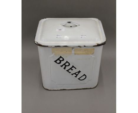 A vintage enamel bread bin. 35 cm high.