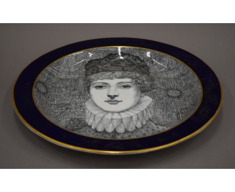 An Ashworths porcelain platter decorated with the portrait of a lady. 43 cm diameter.