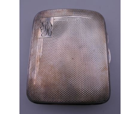 A silver cigarette case. 7 cm wide. 66.6 grammes total weight.