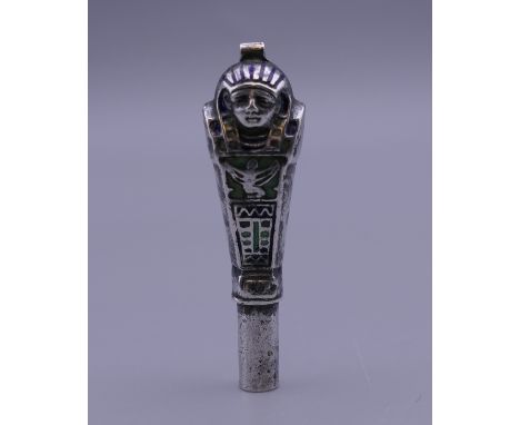 An Egyptian Revival silver and enamel pendant form pencil (lacking lead). 4 cm high.