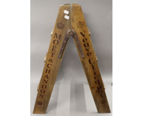 A small decorated wooden step ladder. 86.5 cm high.