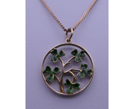 A 9 ct gold and enamel pendant signed C&amp;F (for the maker Crop and Farr) on a 9 ct gold chain. 6.8 grammes total weight.