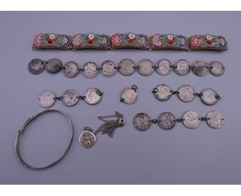 A small quantity of jewellery, including a silver St Christopher pendant on chain, a small silver bangle, a necklace set with