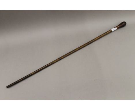 A 19th century rhino horn walking stick. 89 cm long.