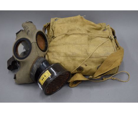 A 1940 British Army gas mask and another
