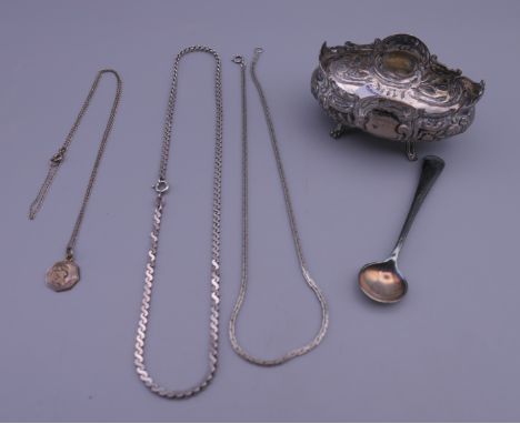 An 800 silver salt, a small quantity of silver jewellery and a plated salt spoon. 57 grammes. 
