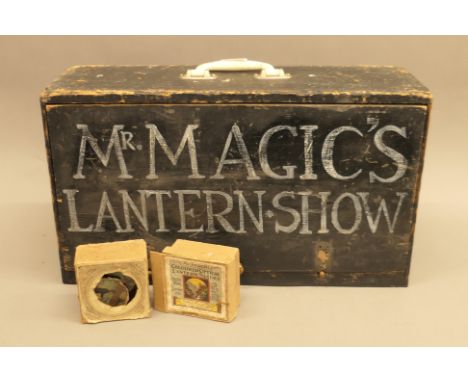 A boxed magic lantern with slides with original gas light burner.