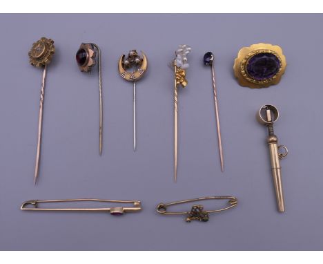 A collection of various gold and other stick pins and brooches. 23.7 grammes total weight.