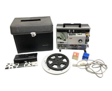 Elmo ST-1200 sound film projector, with instruction manual and black carrying case