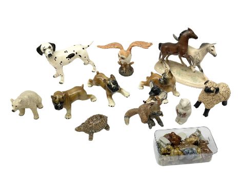 Three West German figures of Boxer dogs, Coopercraft figure of a dalmatian, Crested ware owl, West German horse figure group,