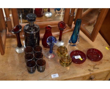 An amethyst glass and silver overlaid liqueur decanter with a set of six matching glasses; together with various coloured gla