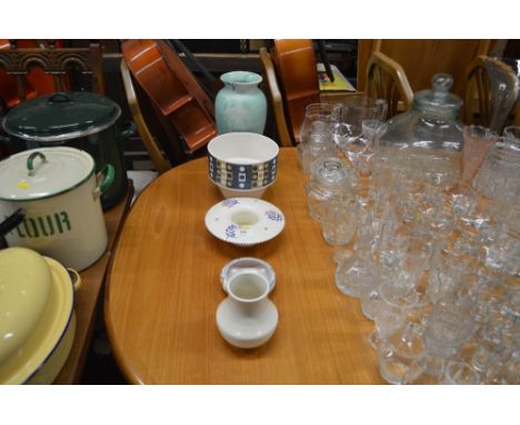 Three items of various Poole pottery; together with a Hornsea vase; and a green glazed vase 