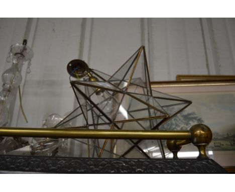 A brass and glass pendant light fitting in the form of a star 
