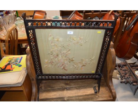 A mahogany and glazed firescreen AF