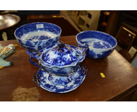 Two blue and white transfer printed bowls; and a flow blue sucrier on stand