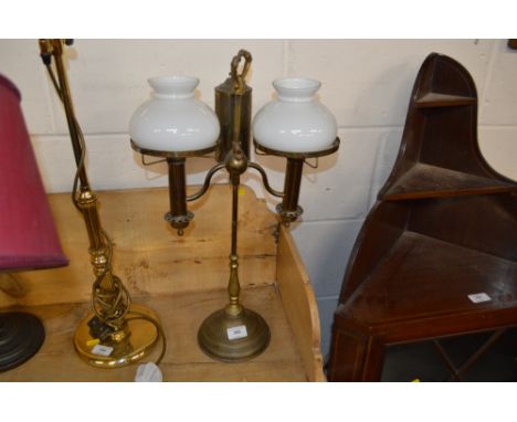 A brass twin branch students lamp 