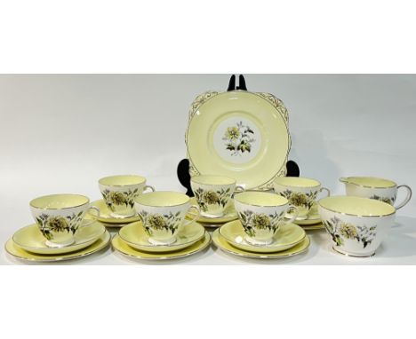 A Royal Grafton part tea service comprising six cups, six saucers, six small plates (w- 16cm), a tea plate, a milk jug, and a