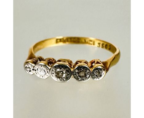 A Edwardian 18ct gold and platinum mounted four stone graduated diamond ring in rub over setting a/f M 1.86g