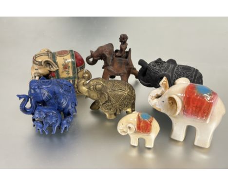 A collection of seven various composition resin and ceramic Asian elephant figures, tallest H x 13cm smallest 8cm (7)