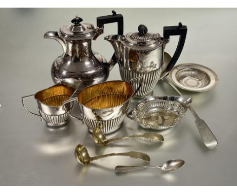 A collection of Epns to include a three piece half lobbed coffee pot, sugar basin and milk jug, a oval coffee pot, a navette 