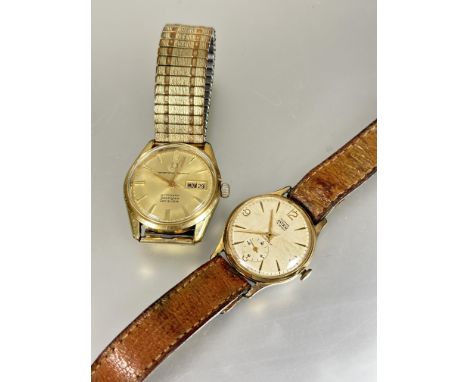A gents Watches of Switzerland gilt metal automatic Seafarer Day &amp; Date wrist watch with baton hour markers and gilt dial