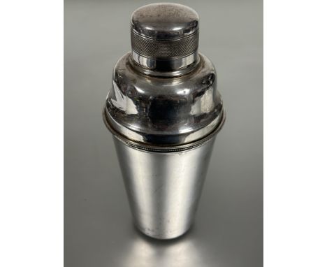 A 1930s Squire Brand&nbsp; Epns cocktail shaker of tapered cylinder design with engine turned cover and lift off top H x 20cm