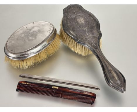 A Sheffield silver backed oval natural bristle hair brush with engraved initials CWM H&nbsp; x 5cm L x 13cm, a Birmingham sil