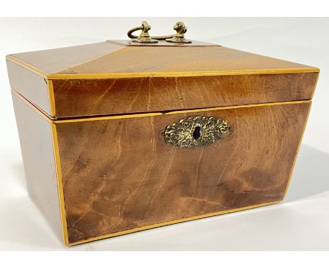 A Georgian sarcophagus form mahogany tea caddy with void interior and later gilt brass handle and escutcheon (h- 13cm, w- 21c