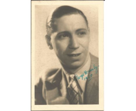 George Formby (1904-1961) Singer / Comedian Signed Vintage 1938 Postcard Photo. Condition 8/10. All autographs come with a Ce