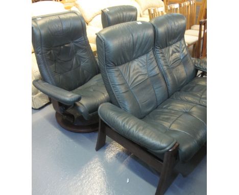 Akores, Norway green leather four piece suite with turned hardwood under frame to include: two seater sofa, pair of swivel ar