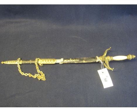 Spanish yellow metal sword and scabbard of souvenir quailty.(B.P. 24% incl. VAT)