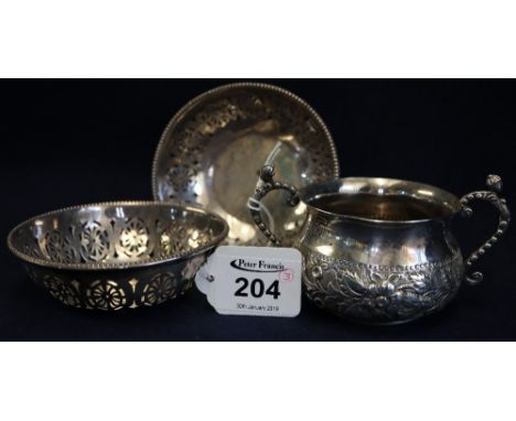 Small silver baluster shaped repousse decorated two handled sucrier with London hallmark, together with pair of pierced silve