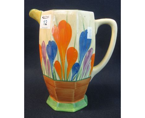 Newport pottery Clarice Cliff design 'Bizarre' series crocus pattern baluster shaped jug with loop handle. Printed marks to b