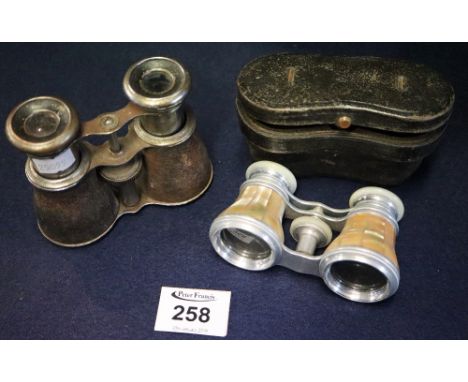 Aitchison of London, 'The Gaiety' mother-of-pearl opera glasses in case together with another pair. (2)(B.P. 24% incl. VAT)