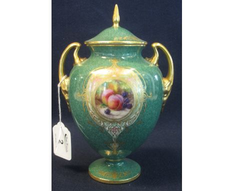 Royal Worcester porcelain baluster urn shaped two handled vase and cover, hand painted with reserve panel of fruit, signed Ri