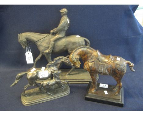 Two composition decorative equestrian groups: mare and foal and racehorse with jockey, together with a modern ceramic Tang st