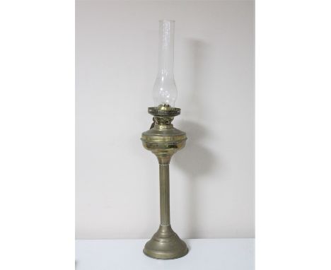 A Victorian duplex twin burner oil lamp with glass chimney  CONDITION REPORT: There is no shade. 